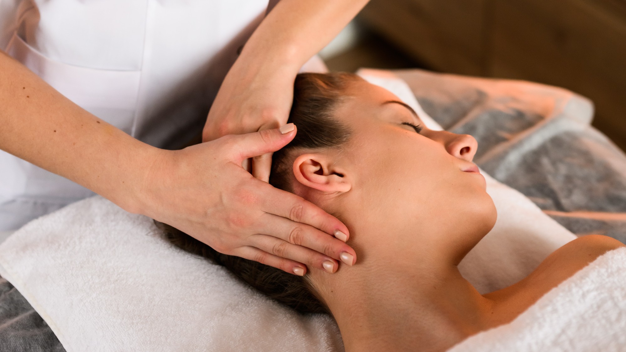 Professional Asian Head Massage session with gentle neck support